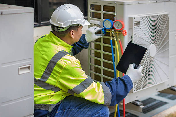 Professional Emergency Hvac Repair technician working in Perkiomenville, PA